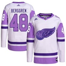 Detroit Red Wings Youth Jonatan Berggren Adidas Authentic White/Purple Hockey Fights Cancer Primegreen Jersey