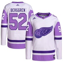 Detroit Red Wings Youth Jonatan Berggren Adidas Authentic White/Purple Hockey Fights Cancer Primegreen Jersey