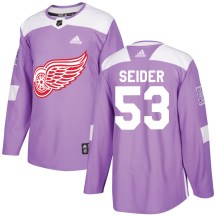 Detroit Red Wings Men's Moritz Seider Adidas Authentic Purple Hockey Fights Cancer Practice Jersey