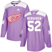 Detroit Red Wings Youth Jonatan Berggren Adidas Authentic Purple Hockey Fights Cancer Practice Jersey